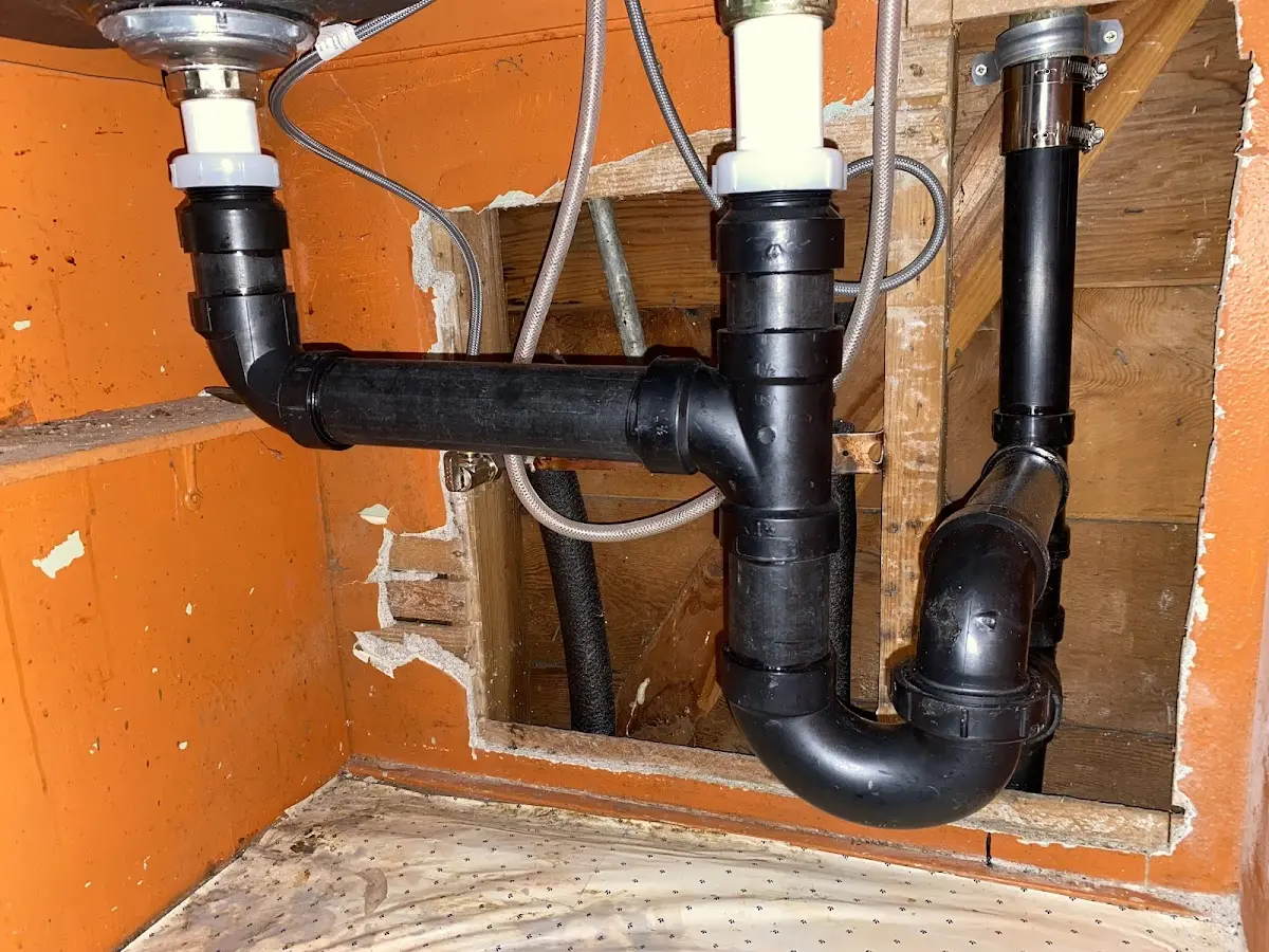Professional Garbage Disposal Repair equipment and tools on the job in Owatonna